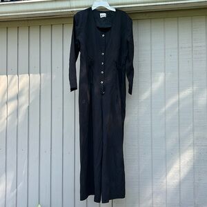 Baz jumpsuit no size tag on it Would guess it to be a medium or size 7/8